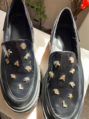 Karl Lagerfeld Black Patent Slip-On Loafers with Gold Letter Studs
